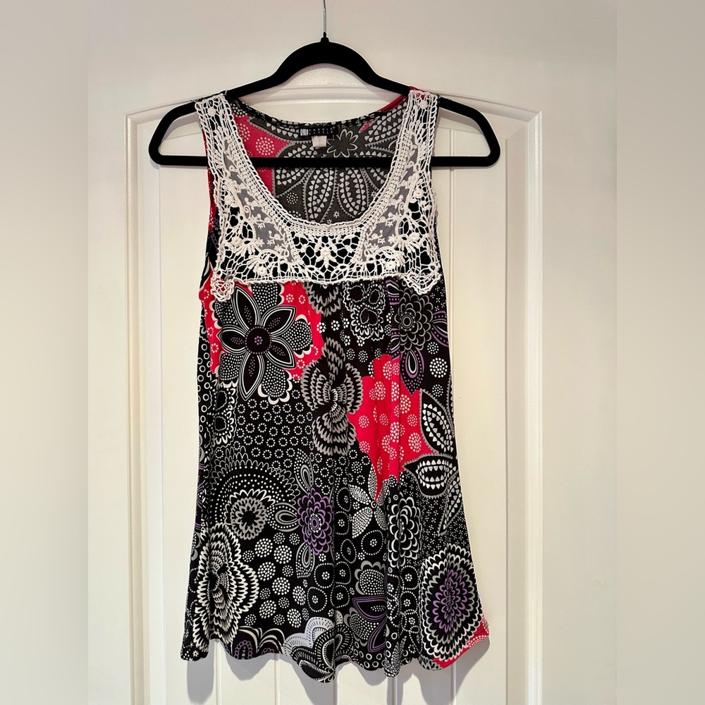 Sleeveless blouse by Carole Little in fun and unique pattern